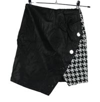 Dámská černo-bílá vzorovaná pleteno/koženková minisukně River Island vel. 32