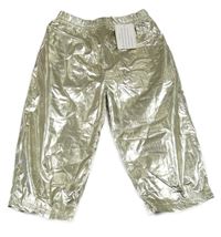 Nové - Zlaté šusťákové podšité kalhoty 