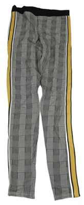 Černo-bílé kostkované legíny s proužky H&M