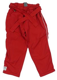 Červené šušťákové nohavice