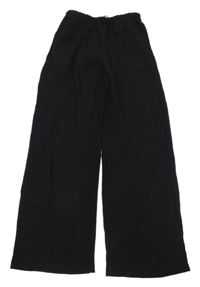 Čierne mačkané nohavice H&M