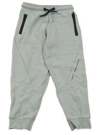 Světlešedé tepláky s nápisem River Island