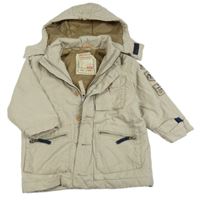 Béžová šušťáková zimná bunda s nášivkami a kapucňou zn. Timberland