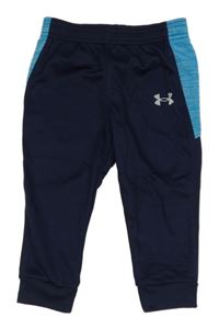 Tmavomodro-modré športové tepláky s logom Under Armour
