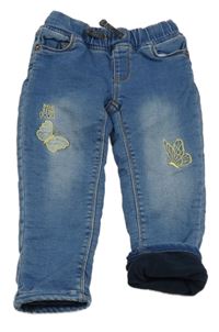 Modré podšité skinny rifle s výšivkami 