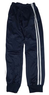 Tmavomodré sportovní tepláky s pruhy