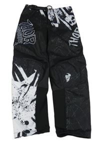 Černo-bílé motorkářské kalhoty s logy a lebkou THOR