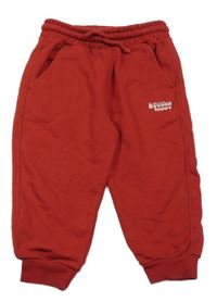 Červené tepláky s nápisom Zara