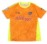 Oranžové vzorované športové tričko s nápisom