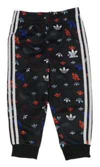 Černé sportovní tepláky s pruhy a logem Adidas