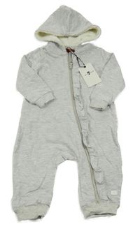 Nové - Šedá tepláková kombinéza s volánky a kapucí 