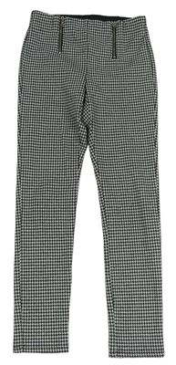 Čierno-bílo/světlešedé vzorované tregínové nohavice so zipy C&A