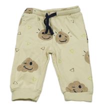 Světlebéžové tepláky se sluníčky Topomini