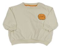 Smotanová oversize mikina s dýněmi Next