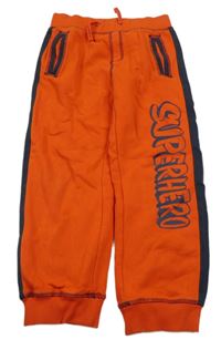 Červeno-tmavomodré tepláky s nápisem a pruhy Topolino