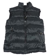 Čierna prešívaná šušťáková zateplená vesta zn. Jack Wolfskin