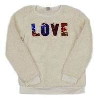 Smetanová huňatá mikina s nápisem z překlápěcích flitrů Tu