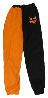 Černo-oranžové tepláky 