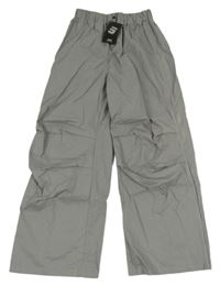 Nové - Sivé plátenné voľné é nohavice JNSA