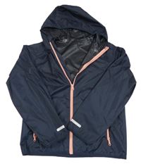 Tmavomodrá šušťáková vodeodolná bunda s kapucňou Crivit