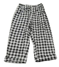 Čierno-biele kockované nohavice