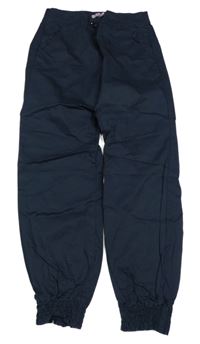 Tmavomodré plátenné cuff nohavice OVS
