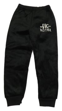 Černé plyšové tepláky s nápisem 