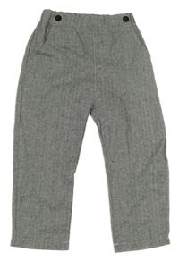 Čierno-biele plátenné nohavice