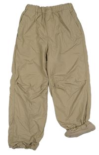 Béžové šusťákové podšité kalhoty Uniqlo