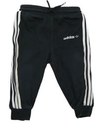 Černo-bílé tepláky s pruhy Adidas