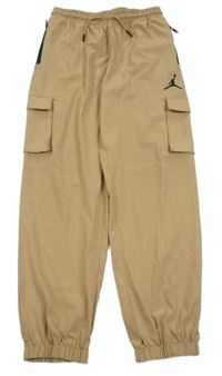 Béžové šusťákové cuff kalhoty s logem Air Jordan