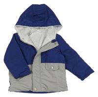 Šedo-tmavomodrá šusťáková zateplená bunda s kapucí 