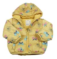 Žlutá šusťáková zimní bunda s motýlky a kapucí M&S