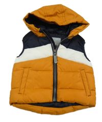 Okrovo-tmavomodro-bílá šusťáková zateplená vesta s kapucí Primark