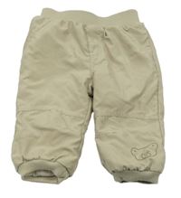 Béžové šusťákové zateplené kalhoty s medvídkem C&A