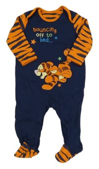 Tmavomodro-oranžový overal a Tygrem George