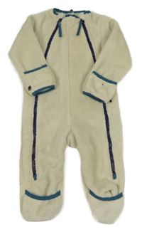 Světlebéžový chlupatý overal s petrolejovým lemem 