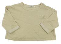 Béžovo-zlaté vzorované crop oversize tričko s vreckom mango