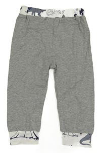 Šedo-bílé melírované tepláky s dinosaury