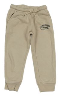 Béžové tepláky s nápisem Matalan