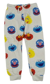 Bílo-barevné tepláky s obrázky - Sezame, otevři se! H&M