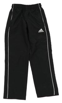 Černo-bílé šusťákové kalhoty s logem Adidas