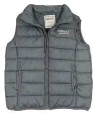 Tmavosivá šušťáková zateplená vesta s nápisom Minoti