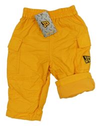 Nové - pomerančové cargo šusťákové podšité kalhoty s nášivkou JCB