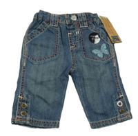 Nové - Tmavomodré capri rifle s motýlem M&S