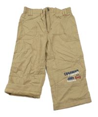 Béžové plátěné podšité kalhoty s nápisem Topolino