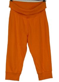 Dámske oranžové capri tepláky