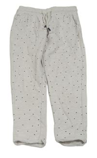 Světlešedé puntíkaté tepláky C&A