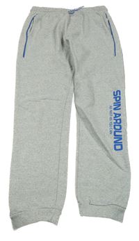 Šedé tepláky s nápisem Y.F.K.