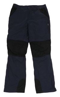 Tmavomodro-čierne outdoorové nohavice s odepínacími nohavicami TCM